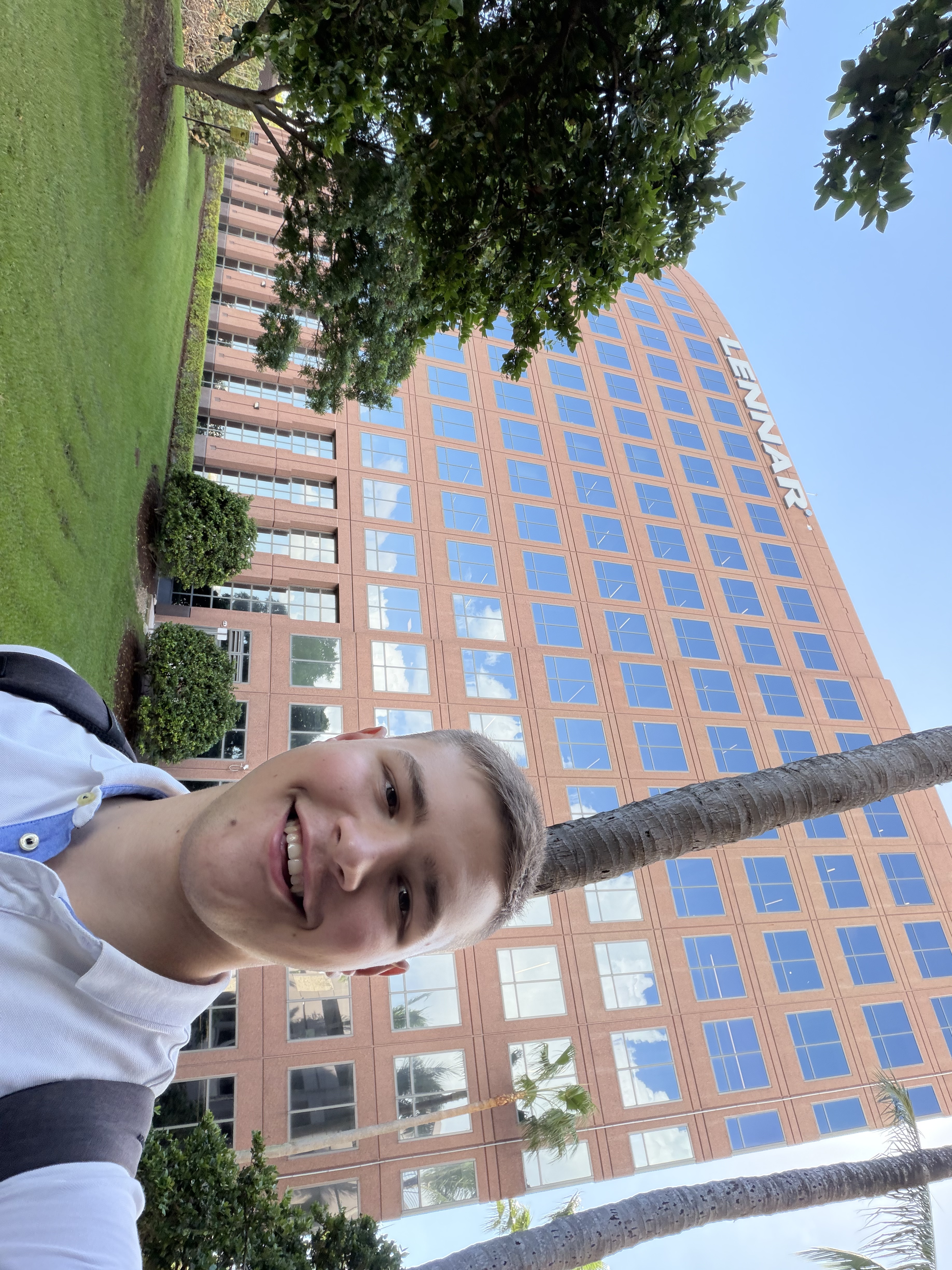 Rasmus standing in front of Lennar office building